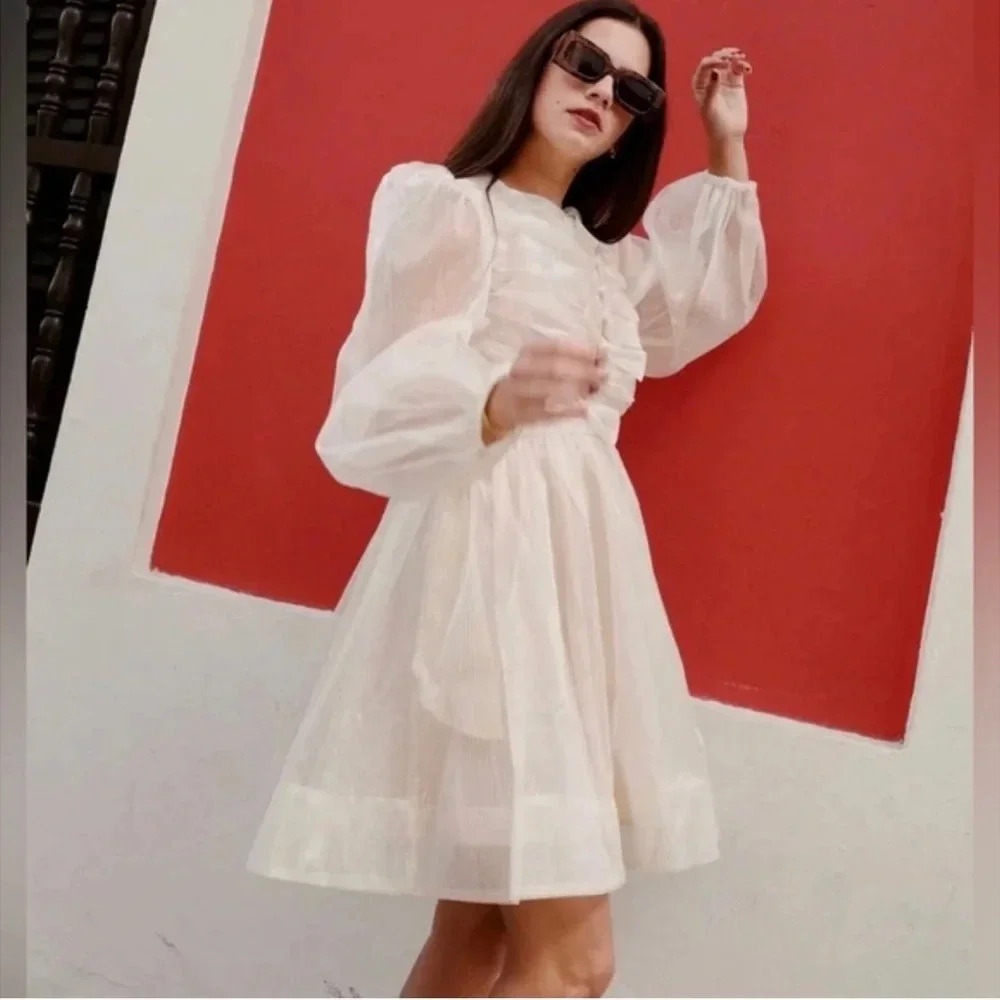 Gold bow front mini dress. Sofie the Label - Picture 3 of 6